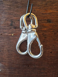 PIVOTING CARABINER
